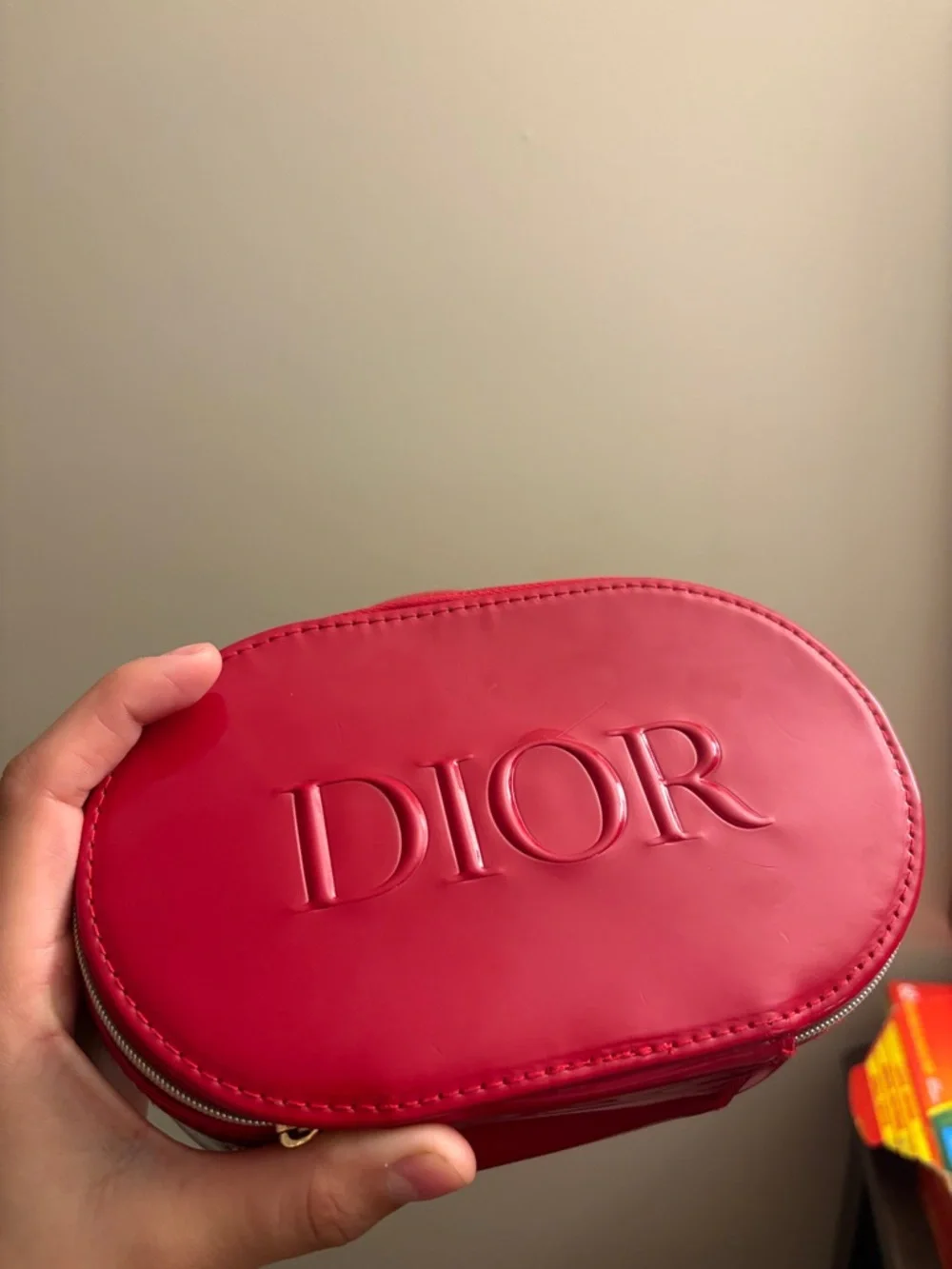 Dior Red Patent Oval Cosmetic Case with Embossed Logo